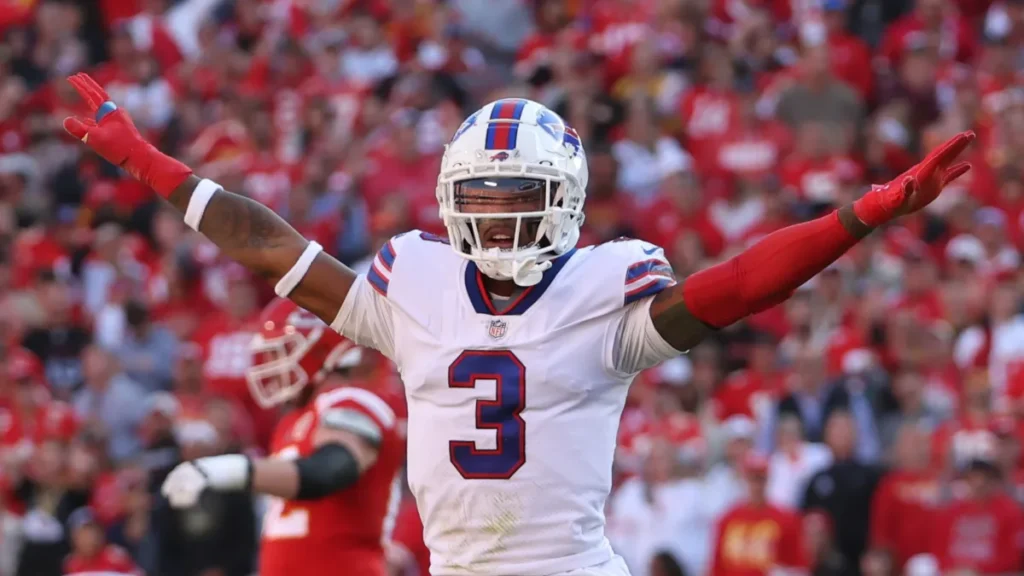 Football player wearing number 3 celebrating on the field.